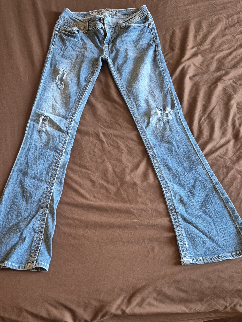 Women’s Light Blue Distressed Flare Jeans